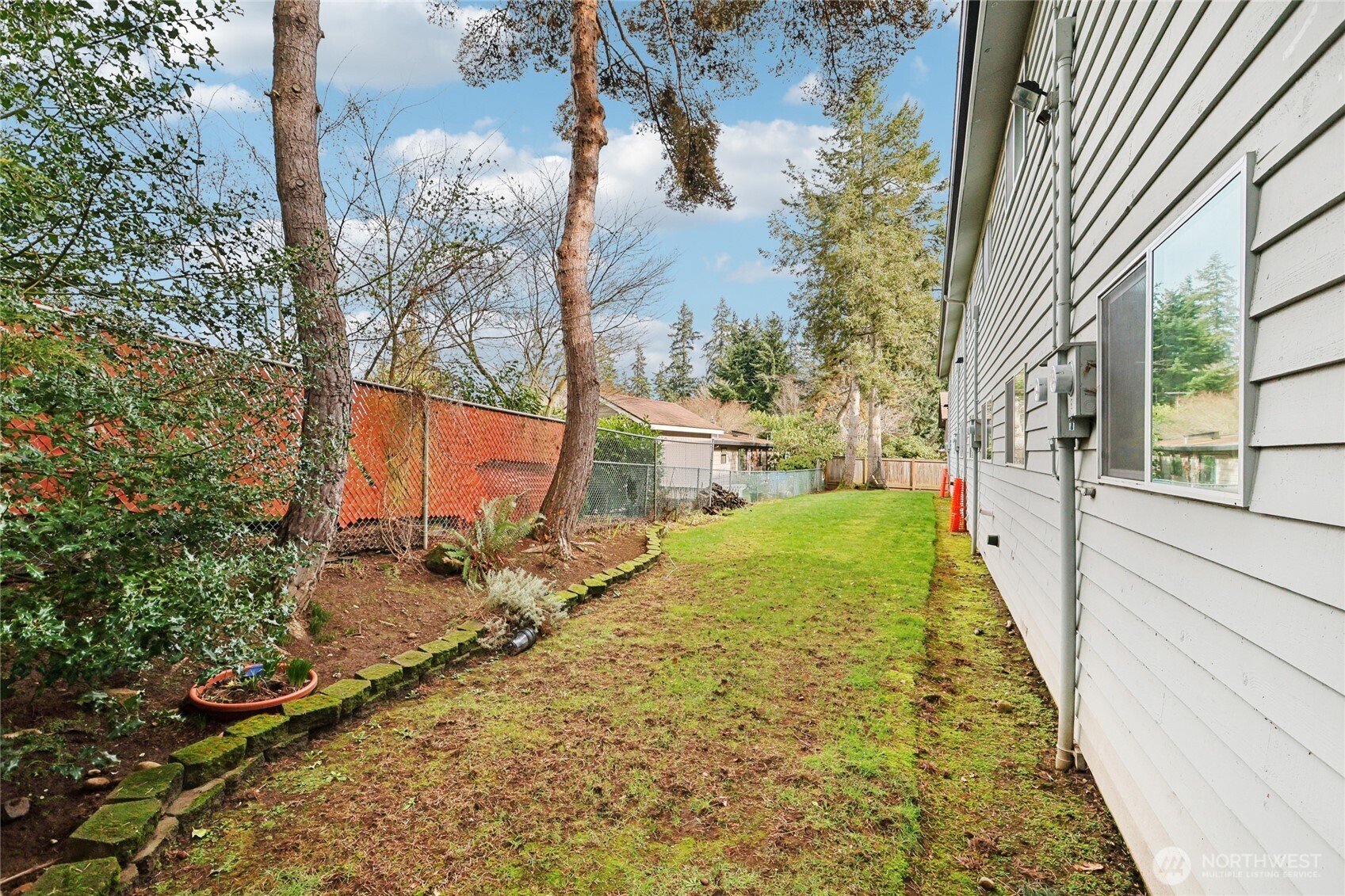 7909 218th Street Southwest, Unit 4 Edmonds, WA 98026 - Photo 25 of 29 a view of a yard with fountain