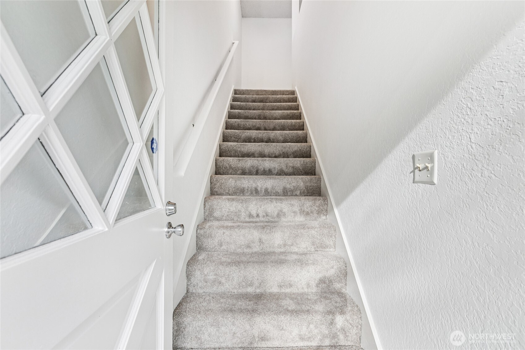 7909 218th Street Southwest, Unit 4 Edmonds, WA 98026 - Photo 4 of 29 a view of staircase with white walls