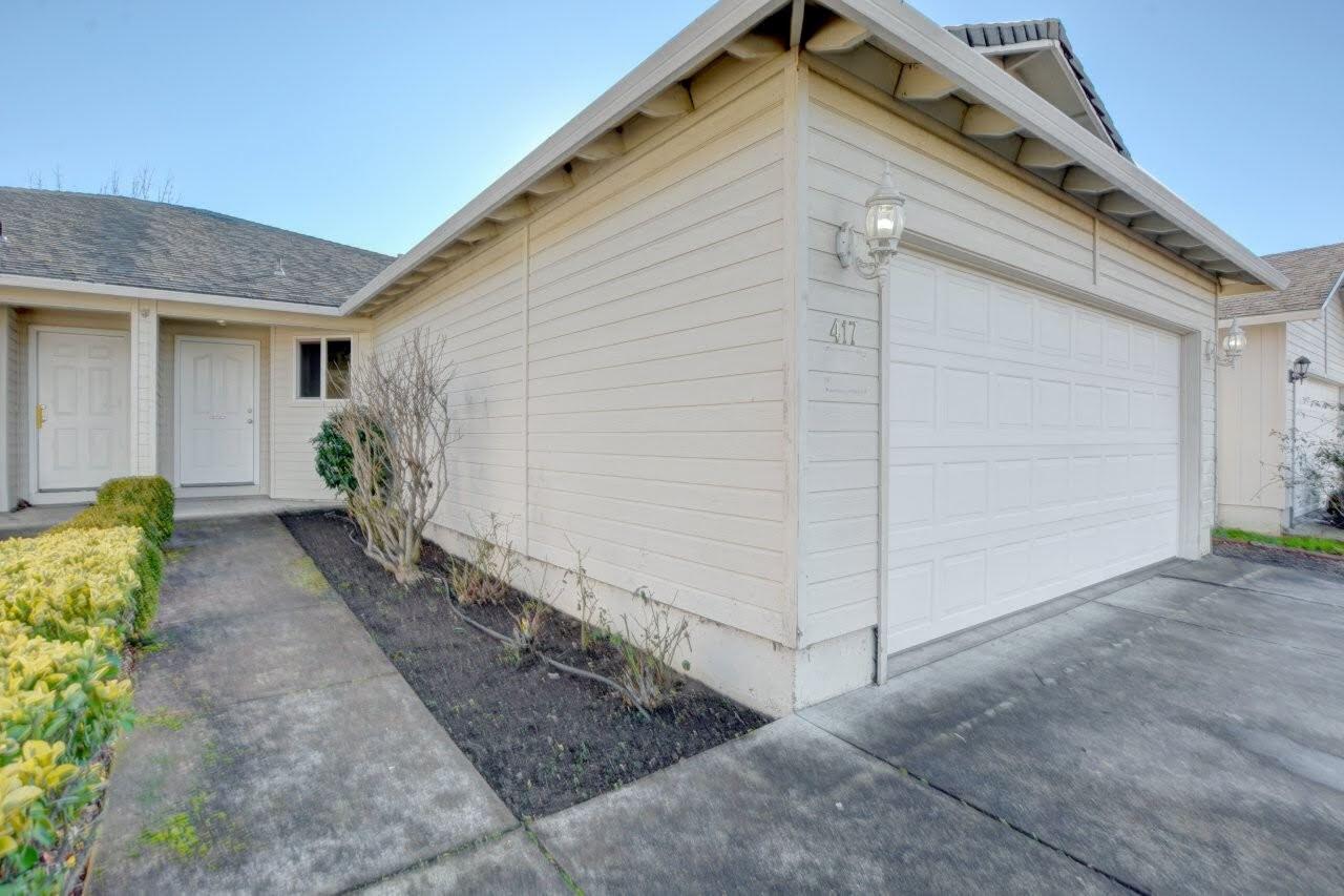 417 Crystal Drive Eagle Point, OR 97524 - Photo 2 of 35 a view of a house with backyard