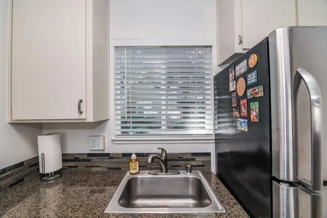 a view of a livingroom with shelves