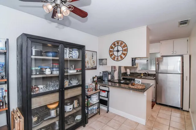 a view of a livingroom with wooden floor
