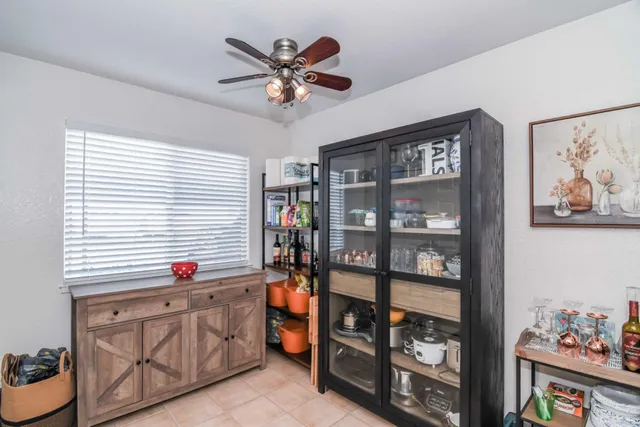 a kitchen with stainless steel appliances granite countertop a refrigerator and a stove