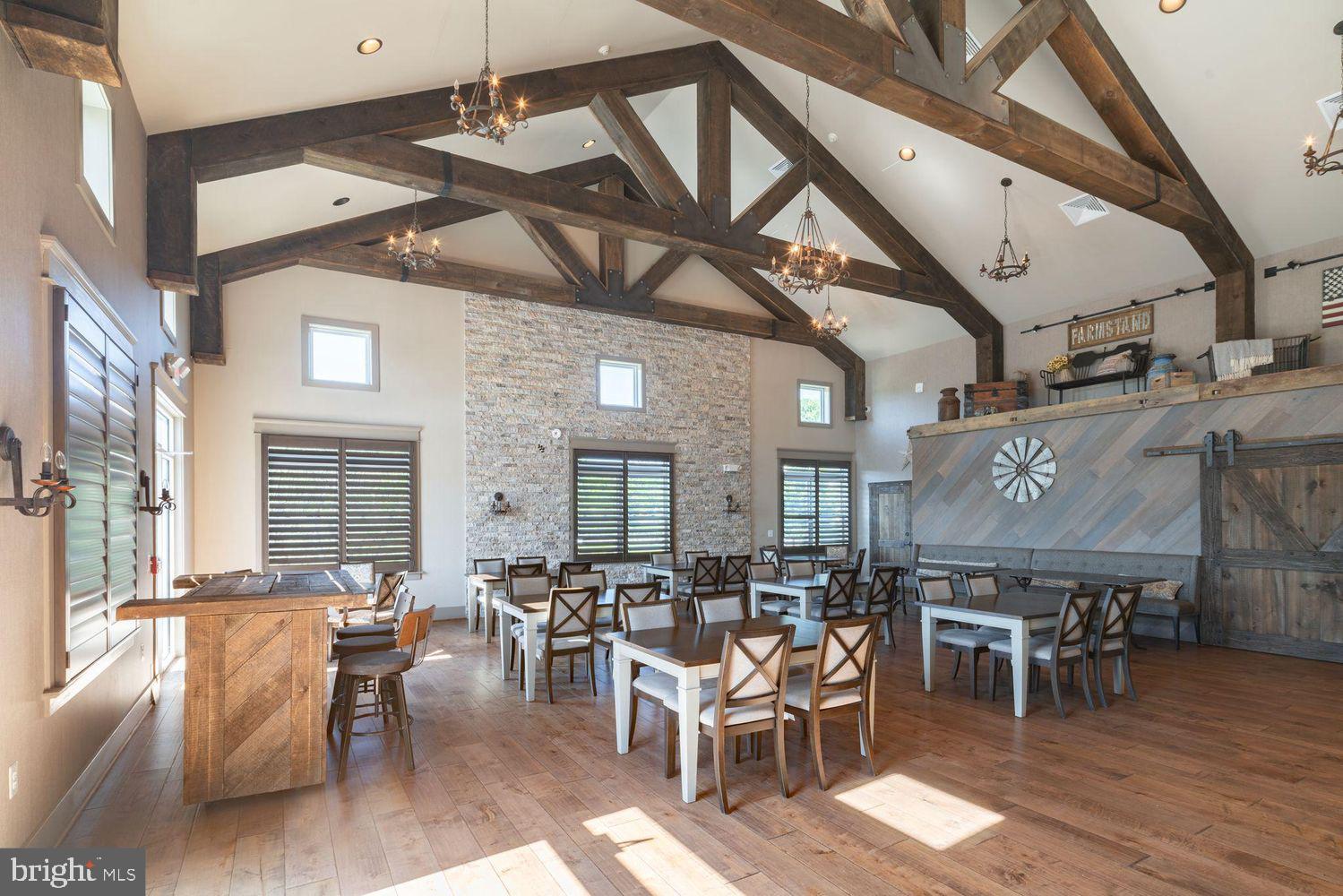 153 Lotus Lane Malvern, PA 19355 - Photo 21 of 29 a view of a dining area with furniture and a chandelier