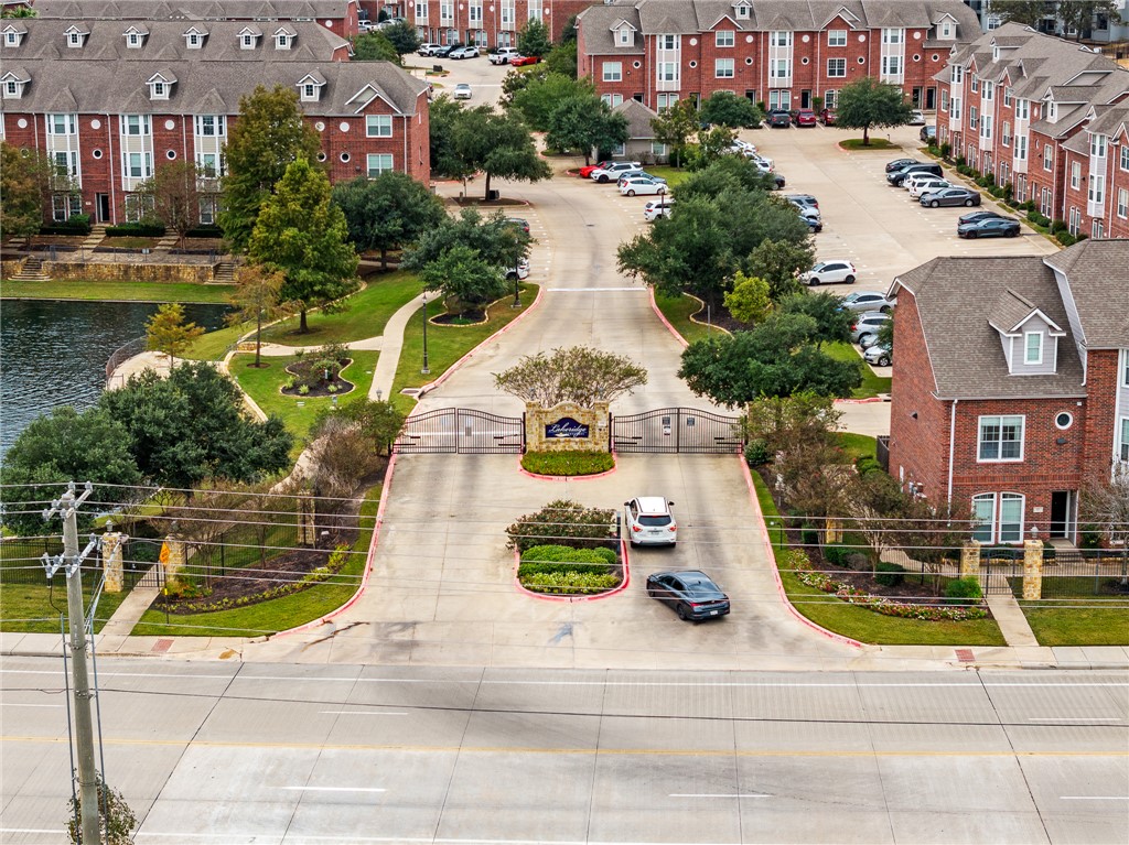 1198 Jones-Butler Road, Unit 1003 College Station, TX 77840 - Photo 42 of 42 a view of multiple houses with a yard