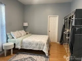 a bedroom with a bed and a table in it