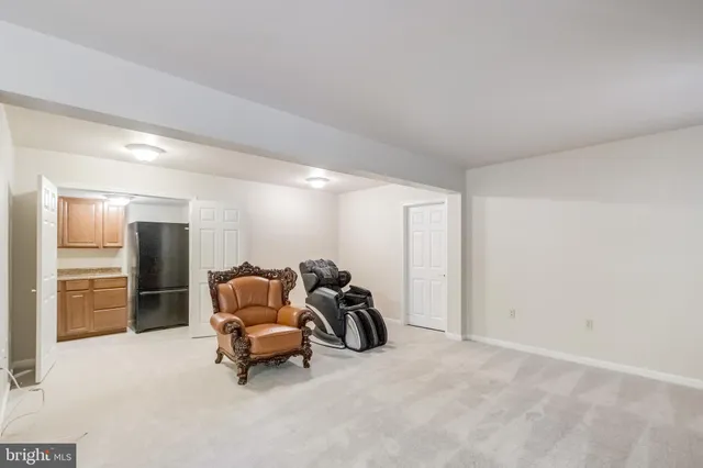 a room with furniture and a wooden floor