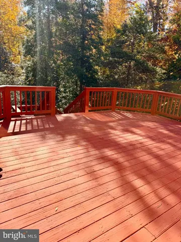 a view of living room with granite countertop furniture and fireplace