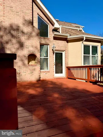 a view of a chairs with wooden fence