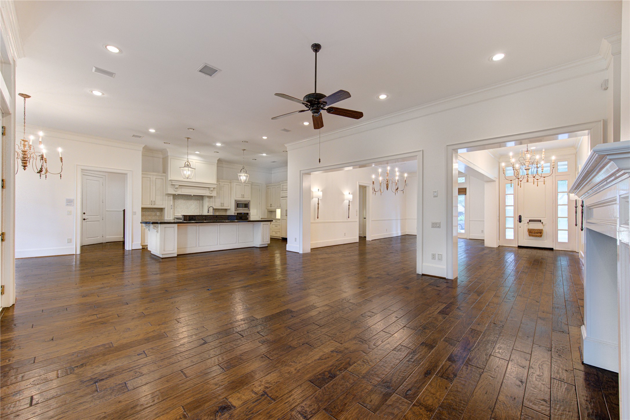 4615 Laurel Street Bellaire, TX 77401 - Photo 8 of 48 Expansive family, kitchen+breakfast, dining, living and entry rooms.