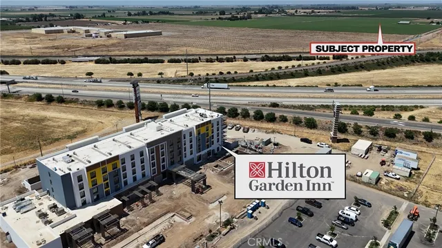 a view of a street with parking