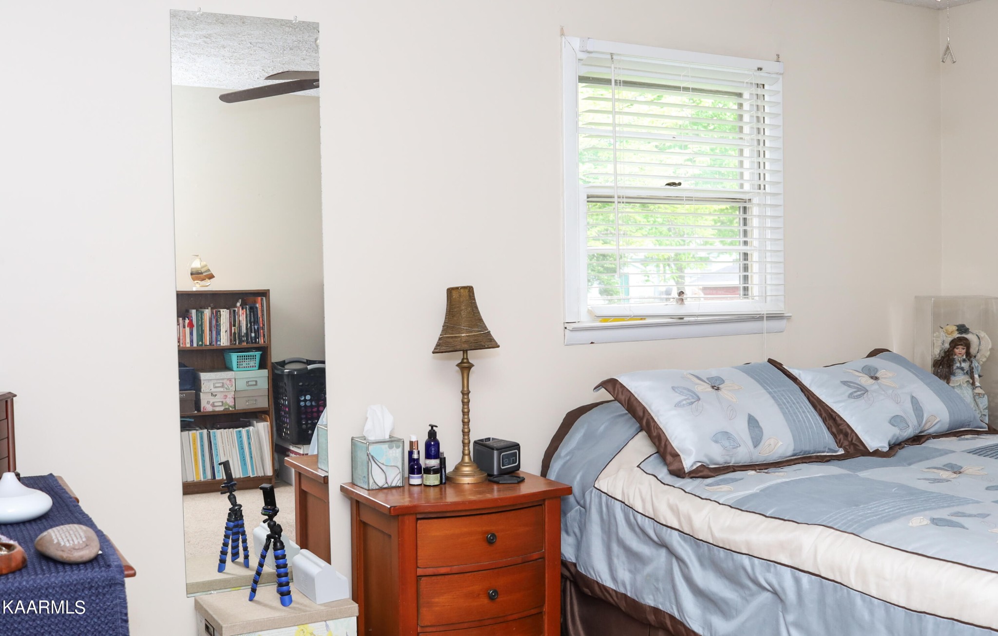 4105 Sullivan Road Knoxville, TN 37921 - Photo 17 of 45 a bedroom with a bed and two windows