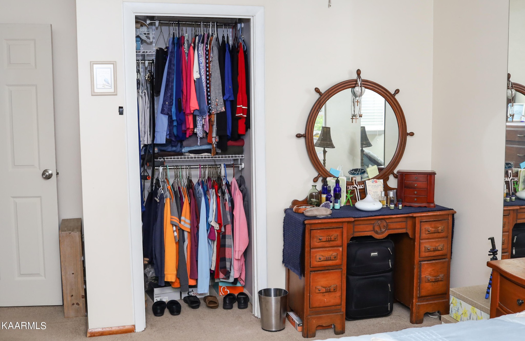 4105 Sullivan Road Knoxville, TN 37921 - Photo 18 of 45 a view of a closet with a mirror and dresser