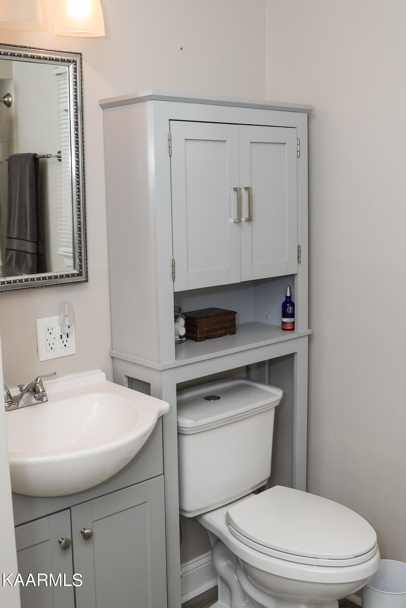 4105 Sullivan Road Knoxville, TN 37921 - Photo 22 of 45 a bathroom with a sink a toilet and a mirror