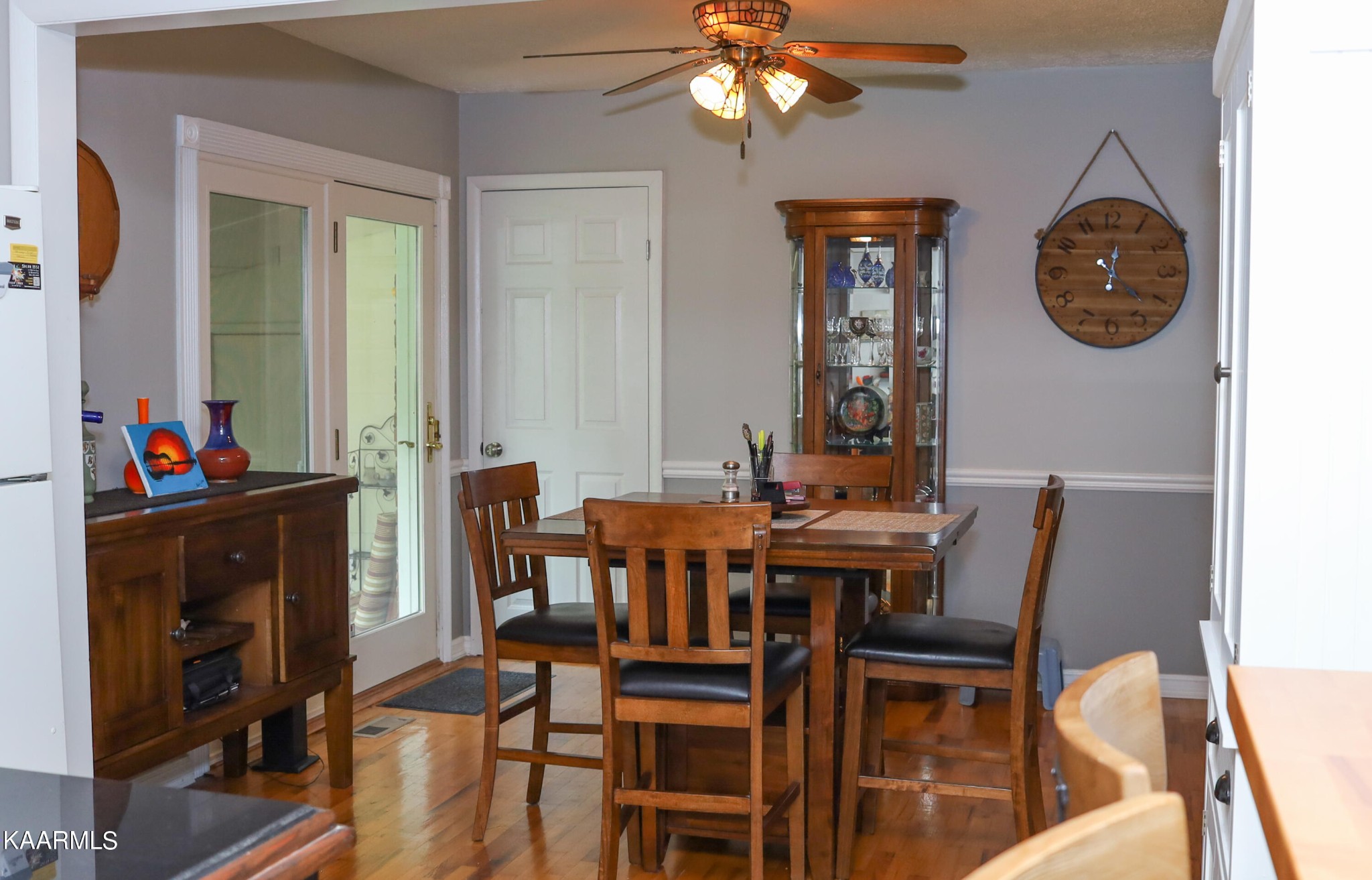 4105 Sullivan Road Knoxville, TN 37921 - Photo 26 of 45 a view of a dining room with furniture and chandelier