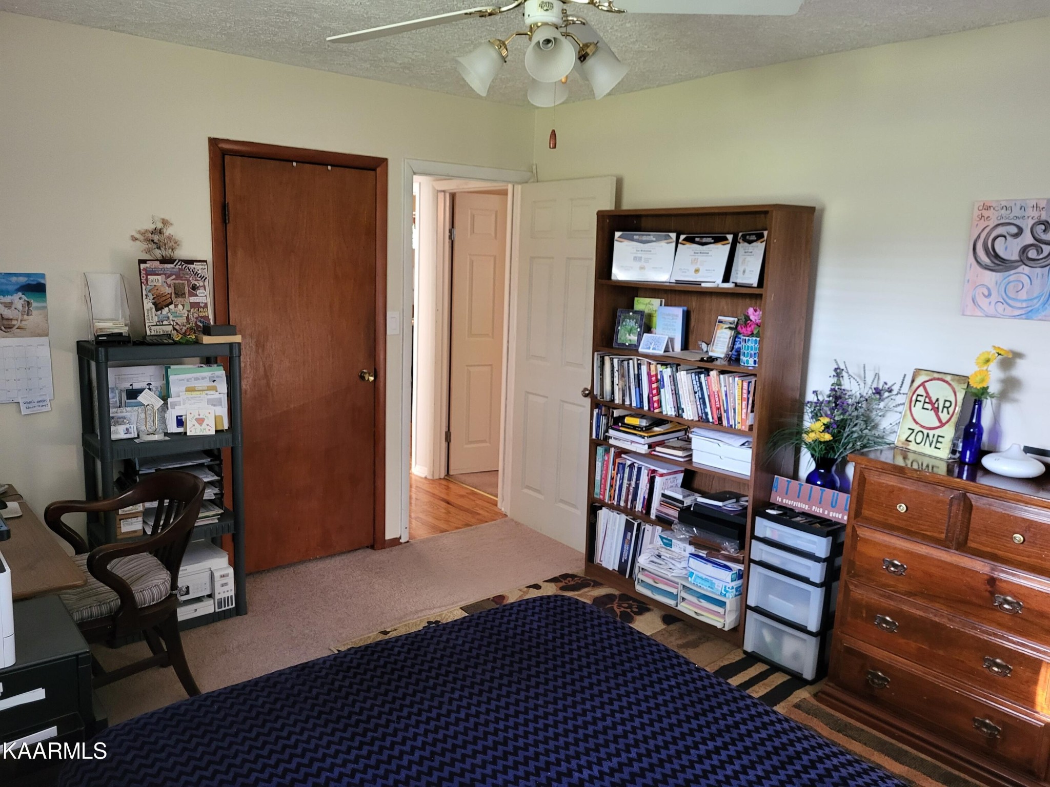 4105 Sullivan Road Knoxville, TN 37921 - Photo 39 of 45 a bedroom with furniture and a book shelf