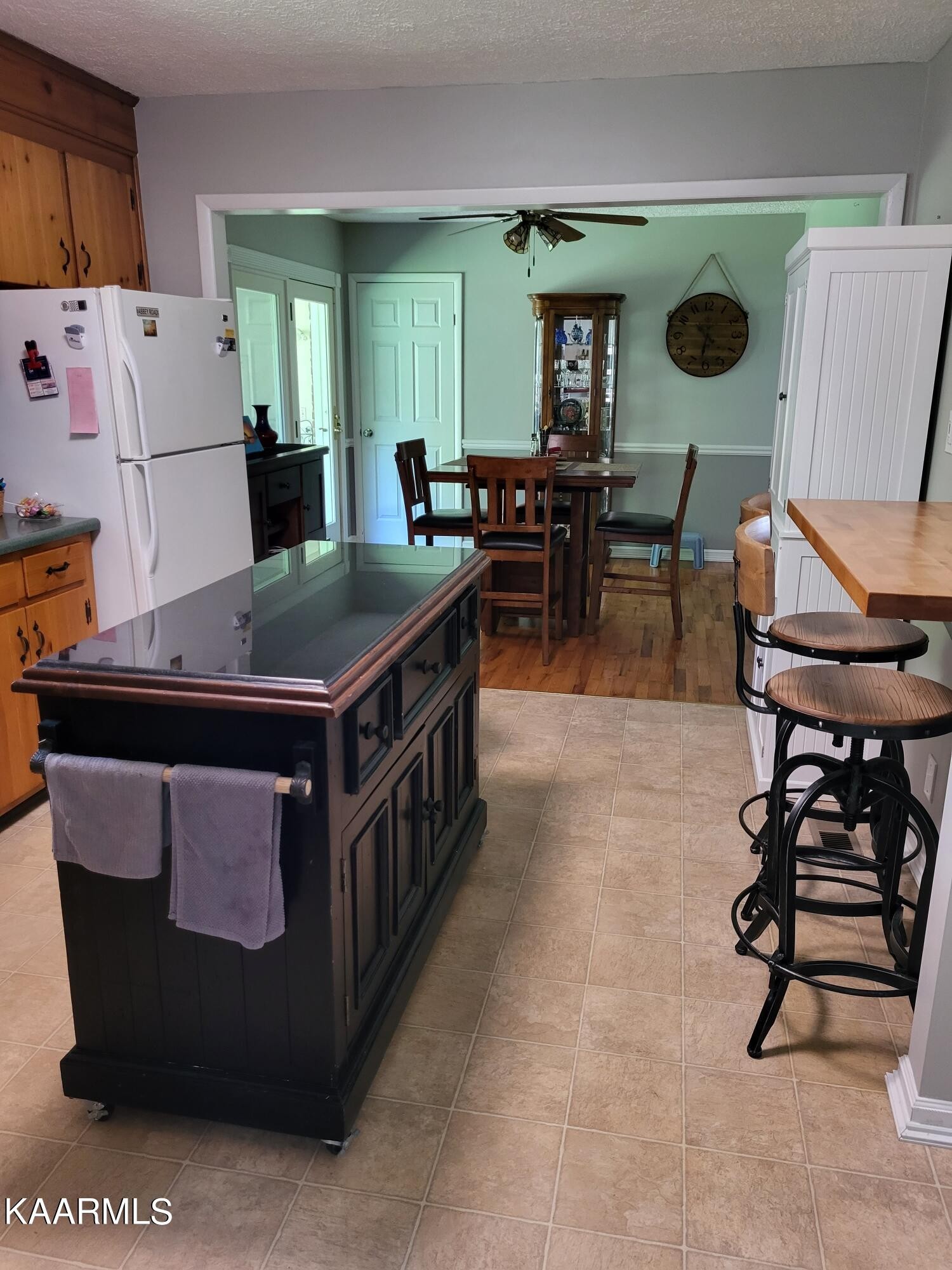 4105 Sullivan Road Knoxville, TN 37921 - Photo 45 of 45 a kitchen with stainless steel appliances granite countertop a table chairs and a refrigerator