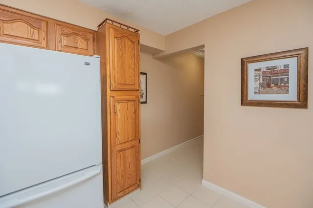 a view of a hallway with closet