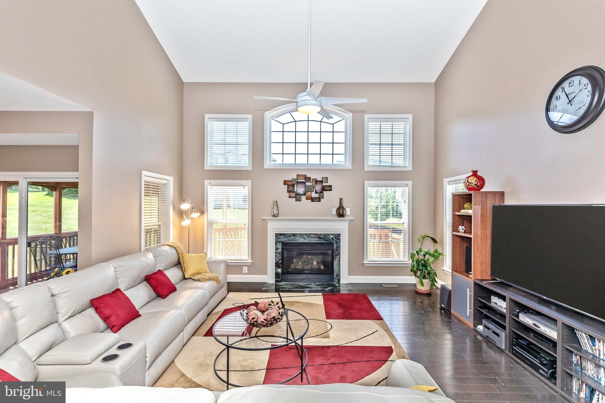 18510 Cornflower Road Boyds, MD 20841 - Photo 19 of 100 Two story family room with gas fireplace