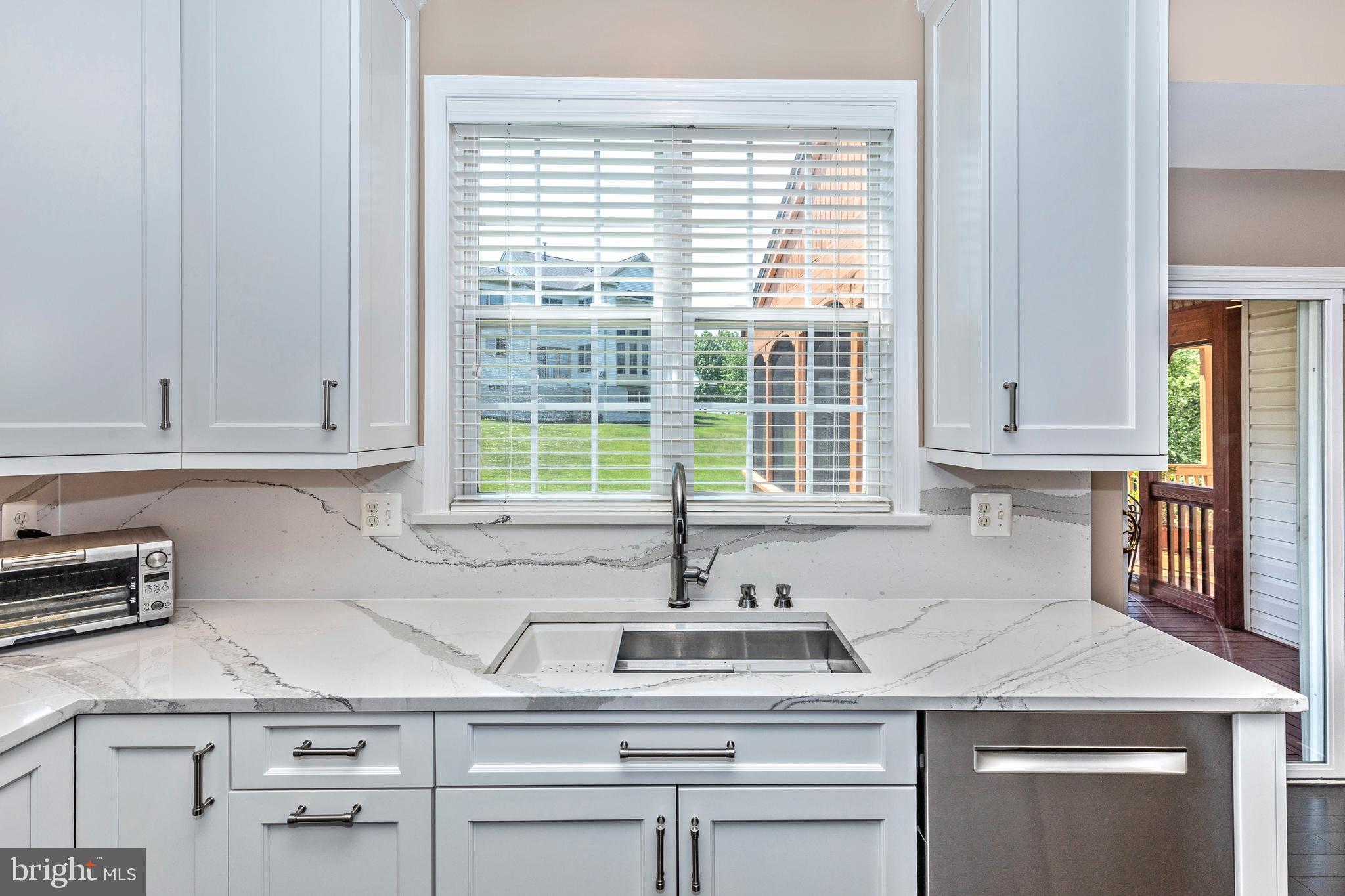 18510 Cornflower Road Boyds, MD 20841 - Photo 30 of 100 Sink has sliders for inserts