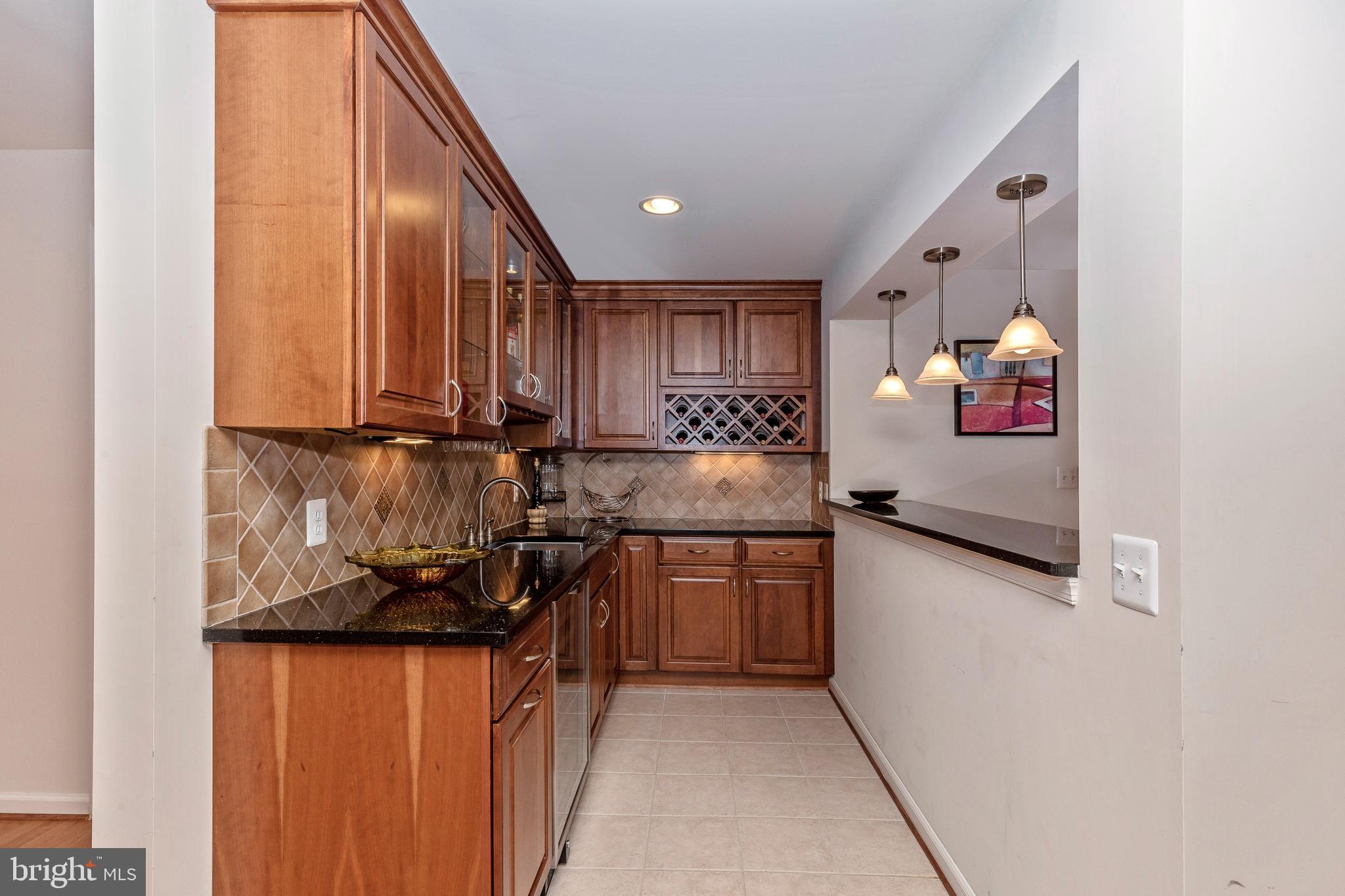 18510 Cornflower Road Boyds, MD 20841 - Photo 80 of 100 Custom cherry bar with granite and backsplash