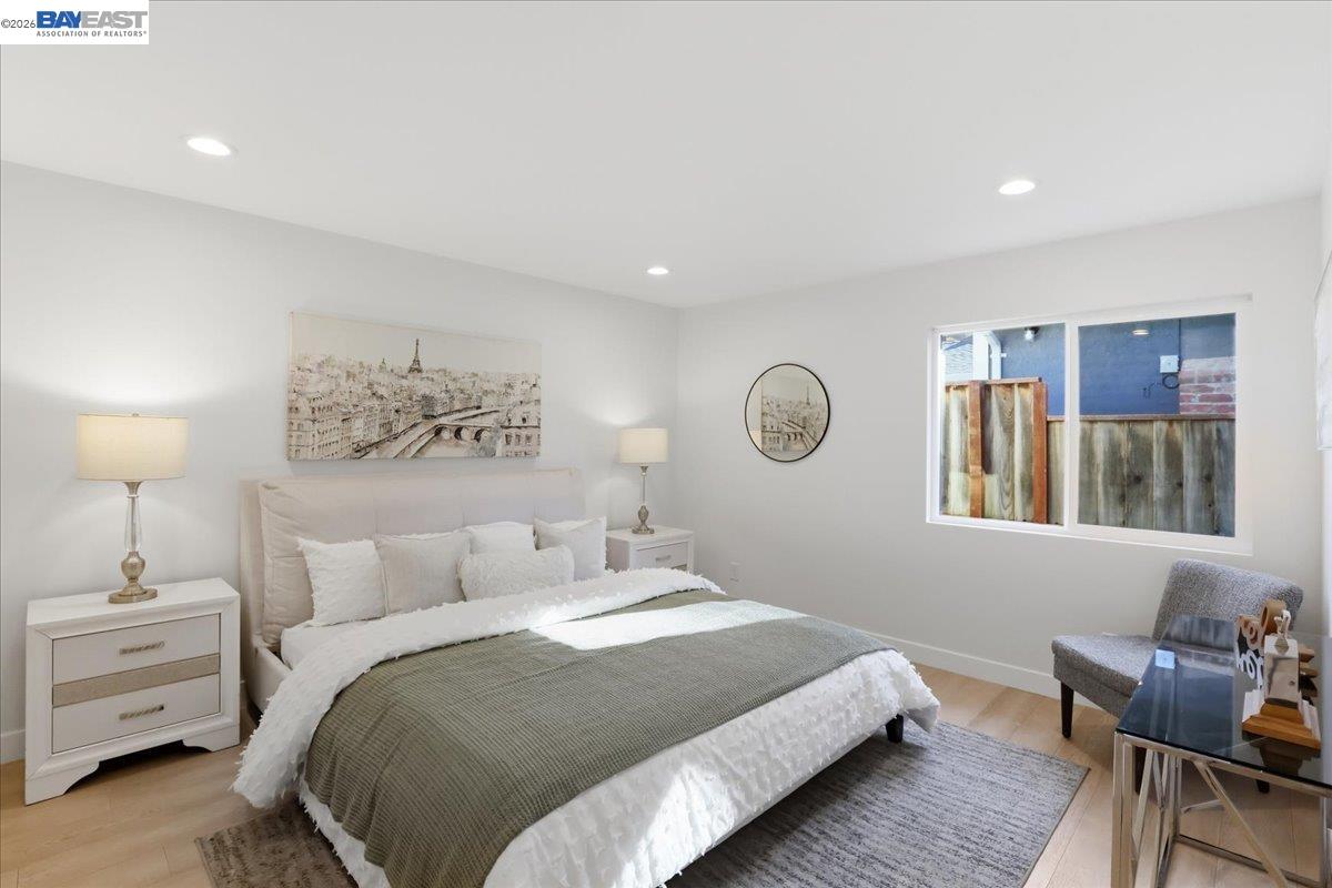 4519 Edwards Lane Castro Valley, CA 94546 - Photo 17 of 46 a bedroom with bed and window