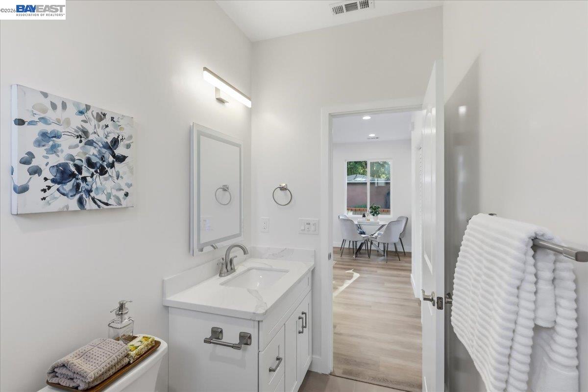 4519 Edwards Lane Castro Valley, CA 94546 - Photo 38 of 46 a bathroom with a sink and a mirror