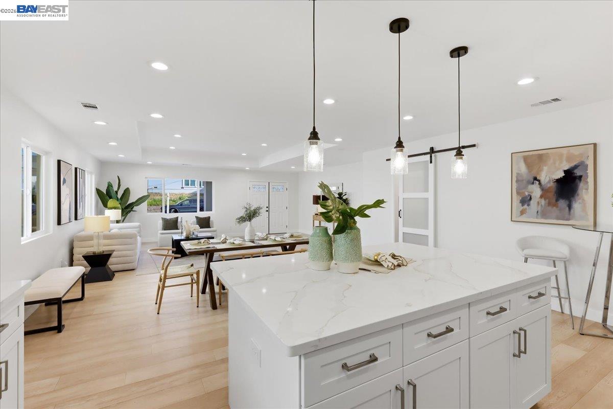 4519 Edwards Lane Castro Valley, CA 94546 - Photo 9 of 46 a view of a kitchen with kitchen island stainless steel appliances a sink table and chairs
