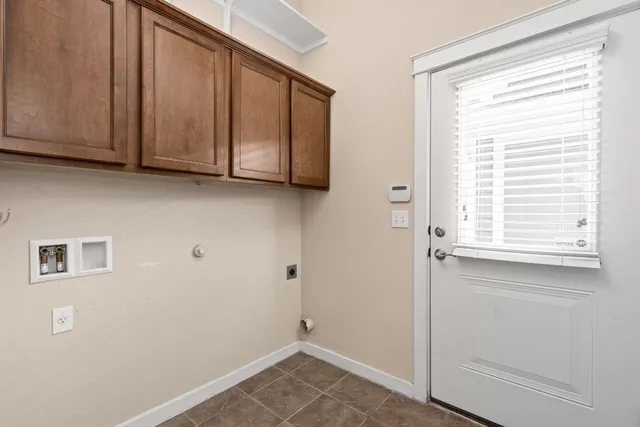 a view of cabinets and window