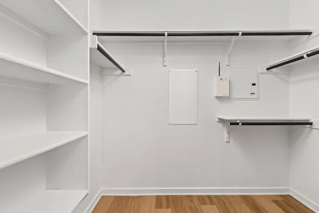 a view of a room with racks on the wall