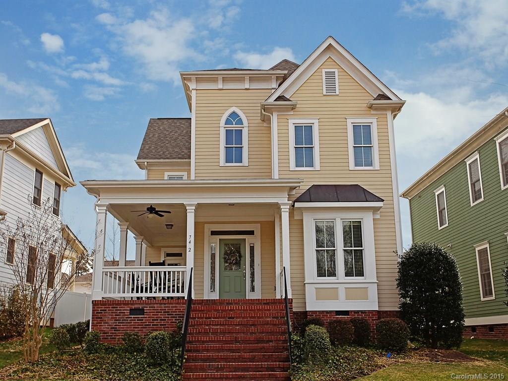 742 Revival Row Fort Mill, SC 29708 - Photo 1 of 24 a front view of a house with a yard