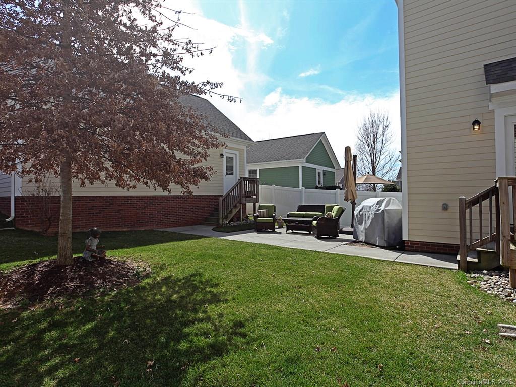 742 Revival Row Fort Mill, SC 29708 - Photo 23 of 24 a view of a backyard with sitting area and garden