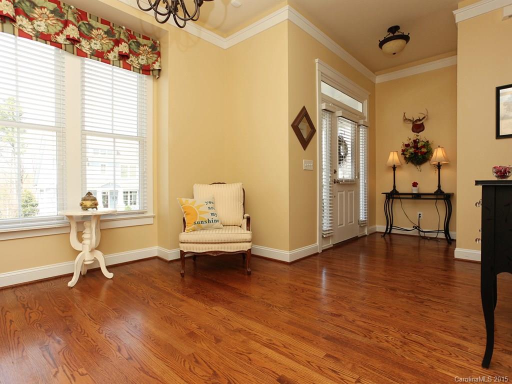 742 Revival Row Fort Mill, SC 29708 - Photo 4 of 24 a living room with furniture and a wooden floor