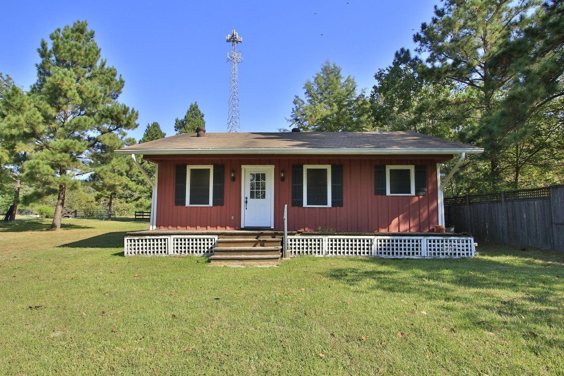 Charming 2 bedroom and 1 bath cottage set amidst a spacious grassy yard and surrounded by mature trees. Ideal for those seeking a peaceful, nature-filled setting.