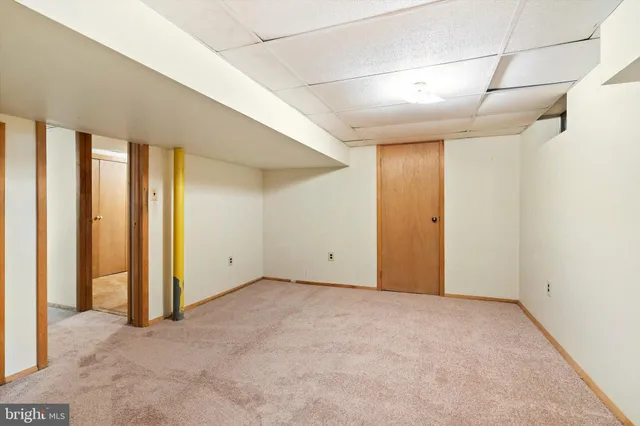 a view of walk in closet with furniture