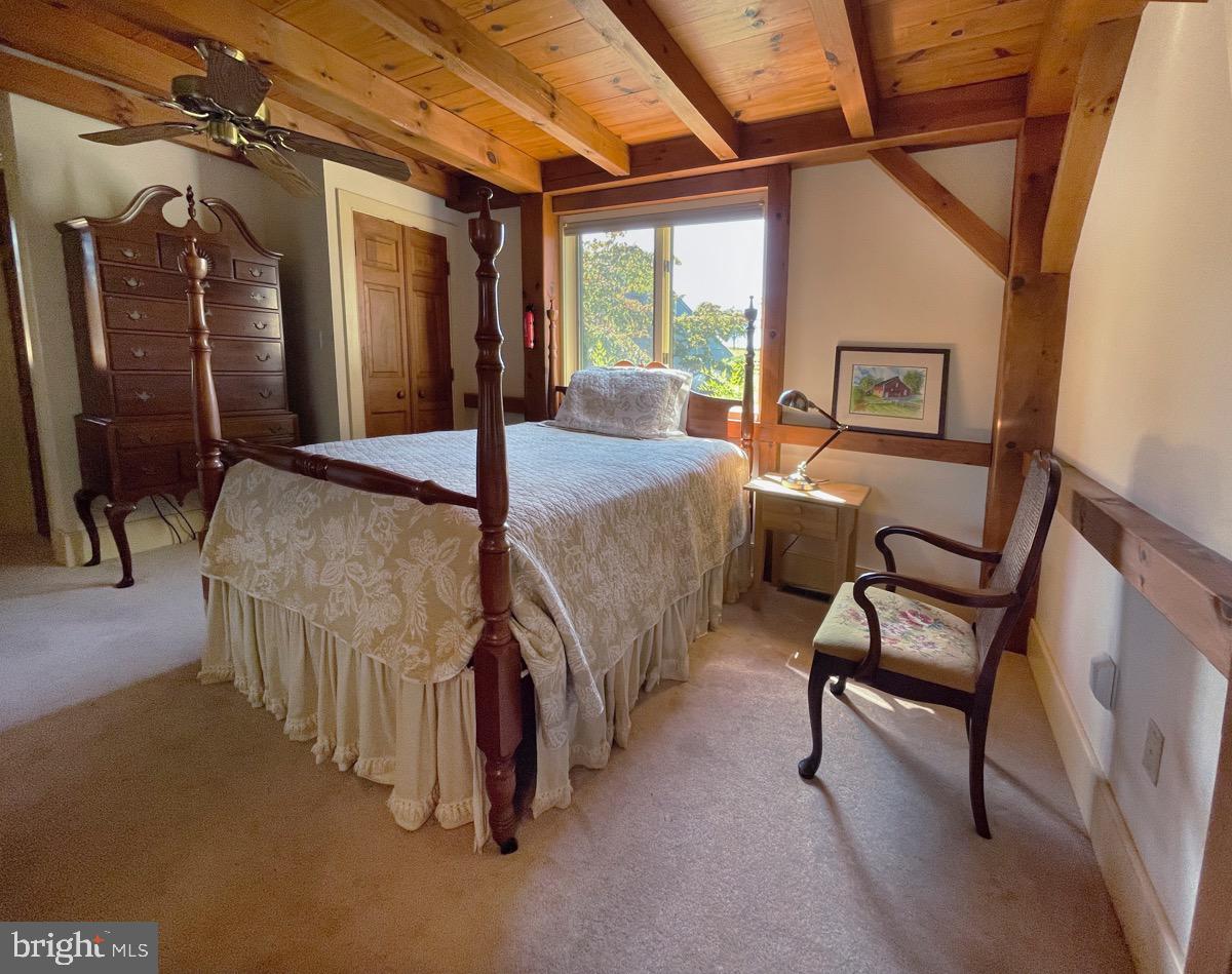 521 Dearing Road Huntly, VA 22640 - Photo 21 of 40 a bedroom with furniture and a window