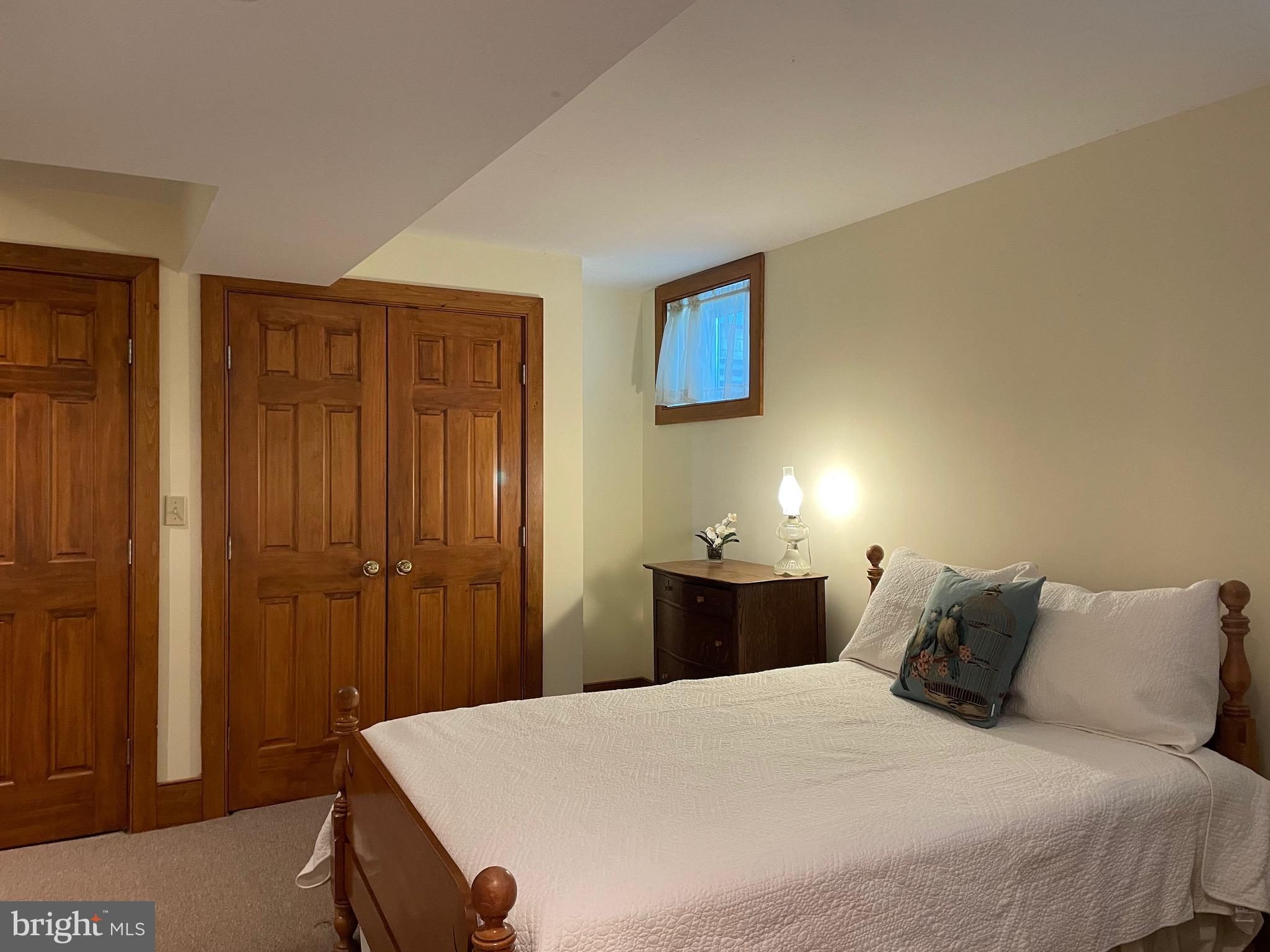 521 Dearing Road Huntly, VA 22640 - Photo 23 of 40 a bedroom with a bed and a table