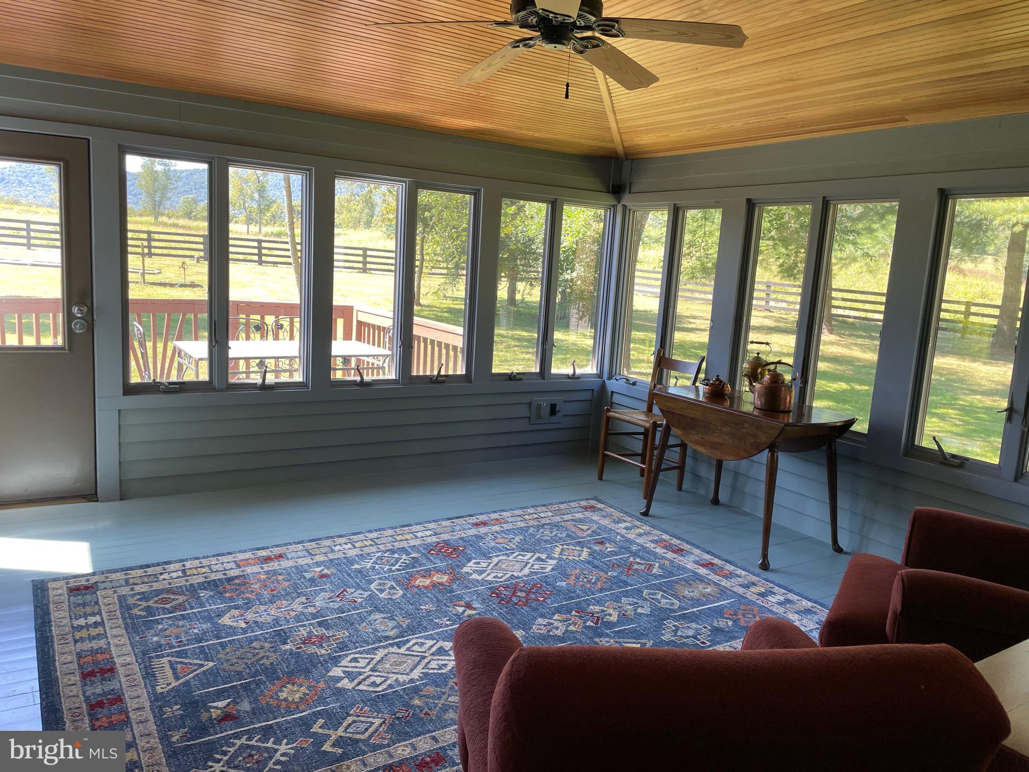521 Dearing Road Huntly, VA 22640 - Photo 24 of 40 a living room with furniture and a large window