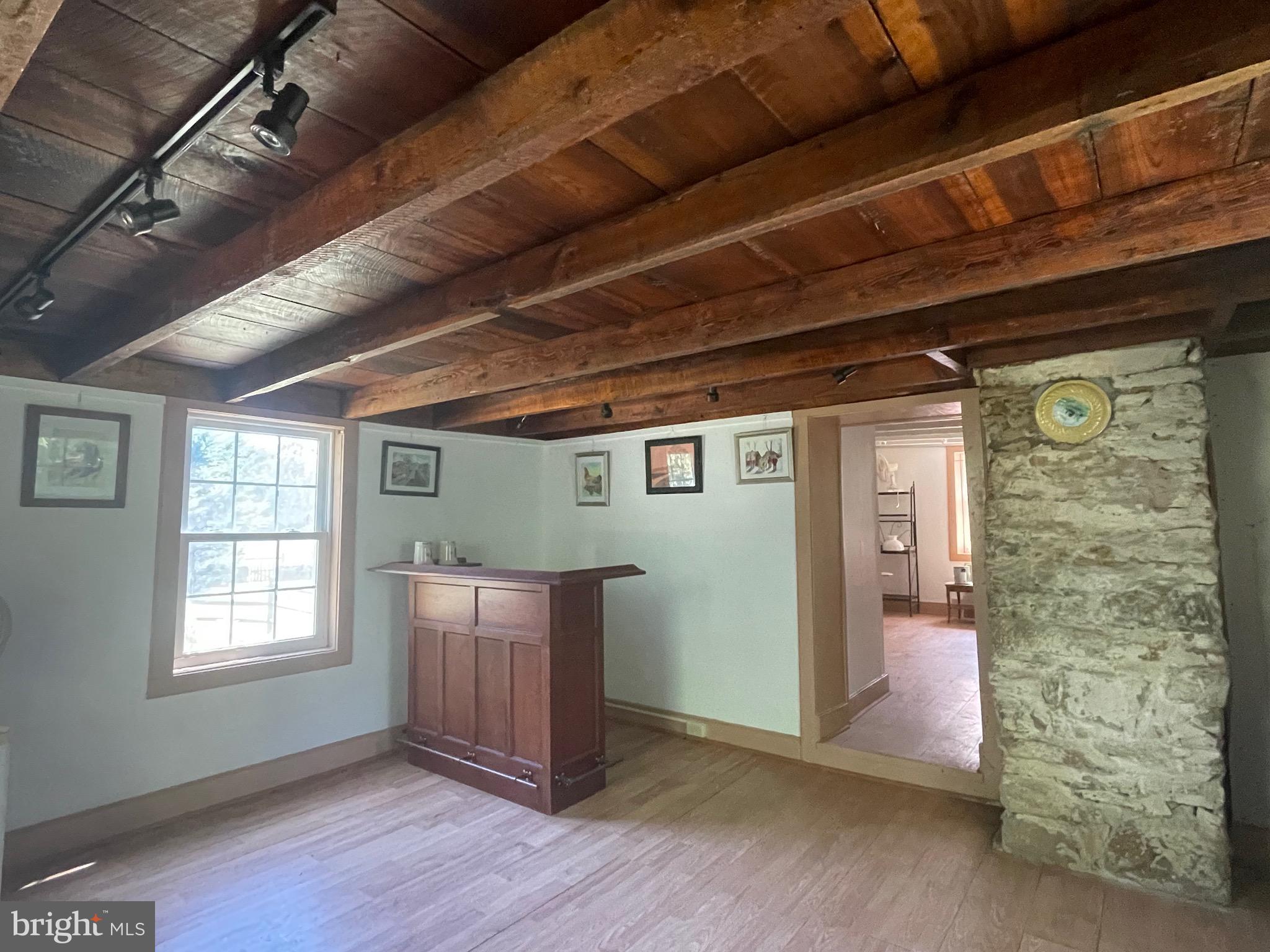 521 Dearing Road Huntly, VA 22640 - Photo 36 of 40 an empty room with wooden floor and windows