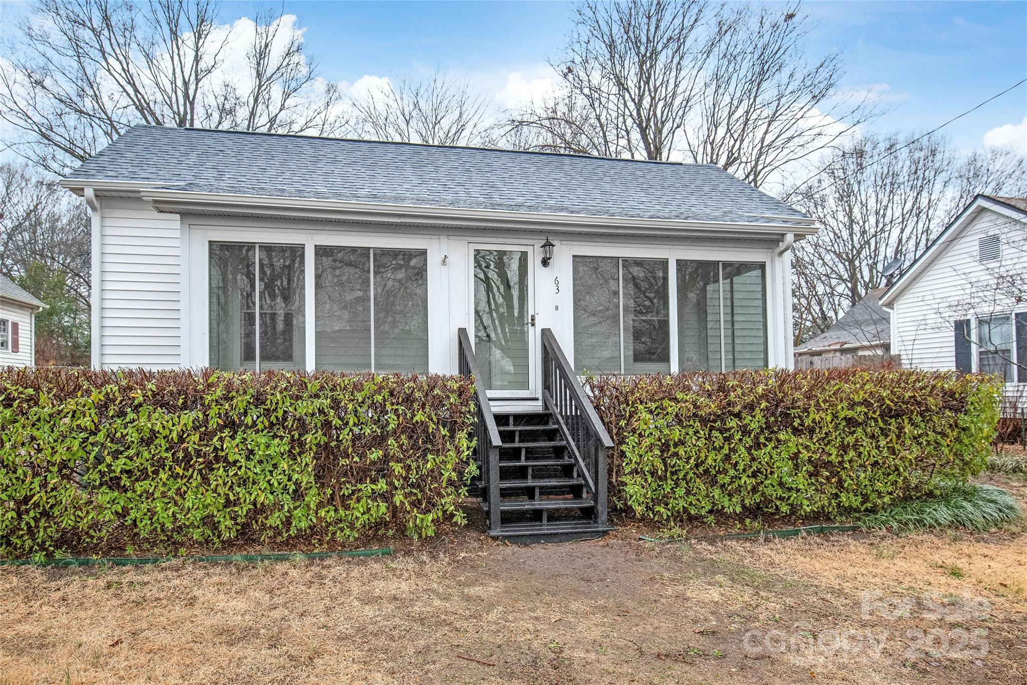 63 3rd Street Northwest Concord, NC 28027 - Photo 2 of 28 a view of a house with a yard