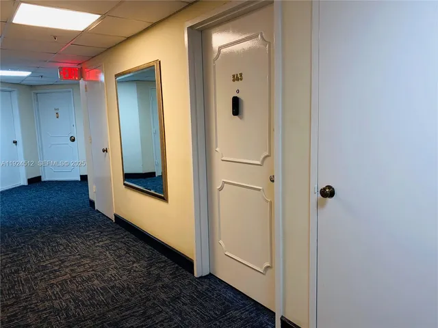 a bathroom with a mirror