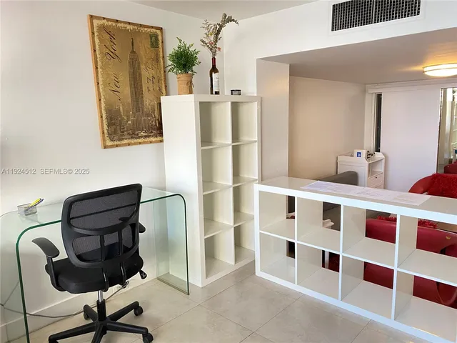 a room with furniture and window