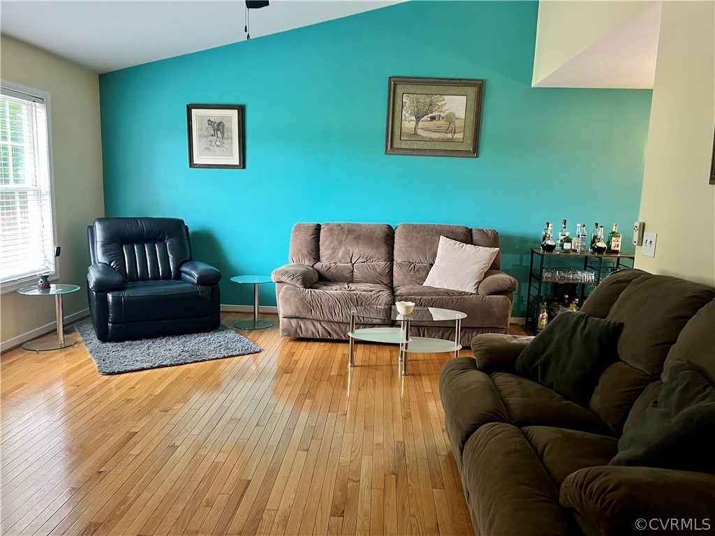 8428 Rowanty Road Carson, VA 23830 - Photo 5 of 22 a living room with furniture and a wooden floor