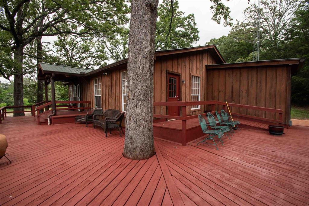 3389 Pvt Road Van, TX 75790 - Photo 17 of 31 a view of backyard with deck and seating space