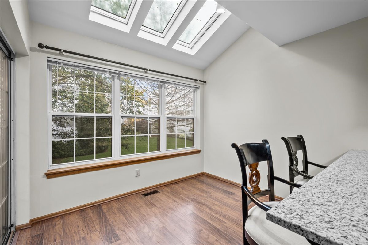 1215 Koster Court Geneva, IL 60134 - Photo 12 of 22 a view of a workspace with furniture and a window