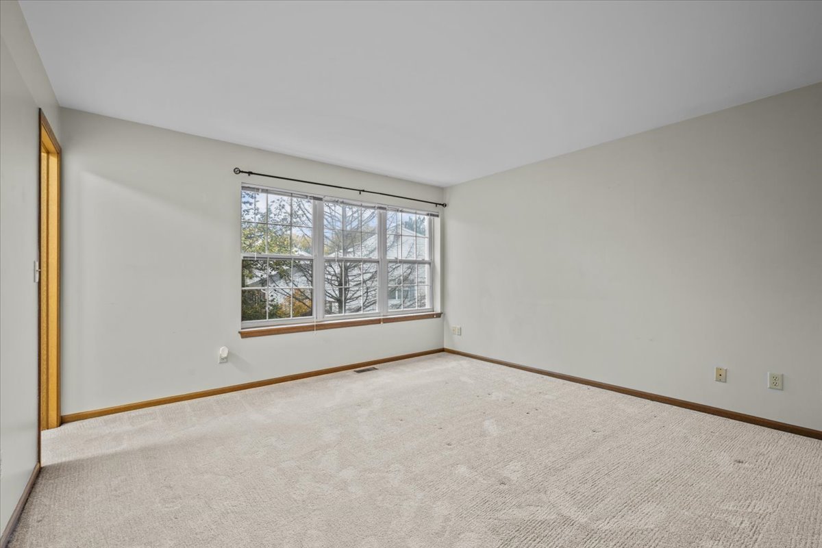 1215 Koster Court Geneva, IL 60134 - Photo 14 of 22 a view of an empty room with a window