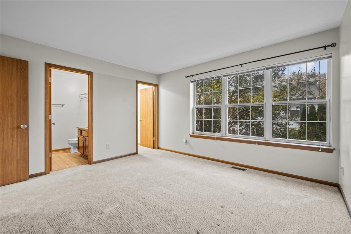 1215 Koster Court Geneva, IL 60134 - Photo 15 of 22 a view of an empty room with a window