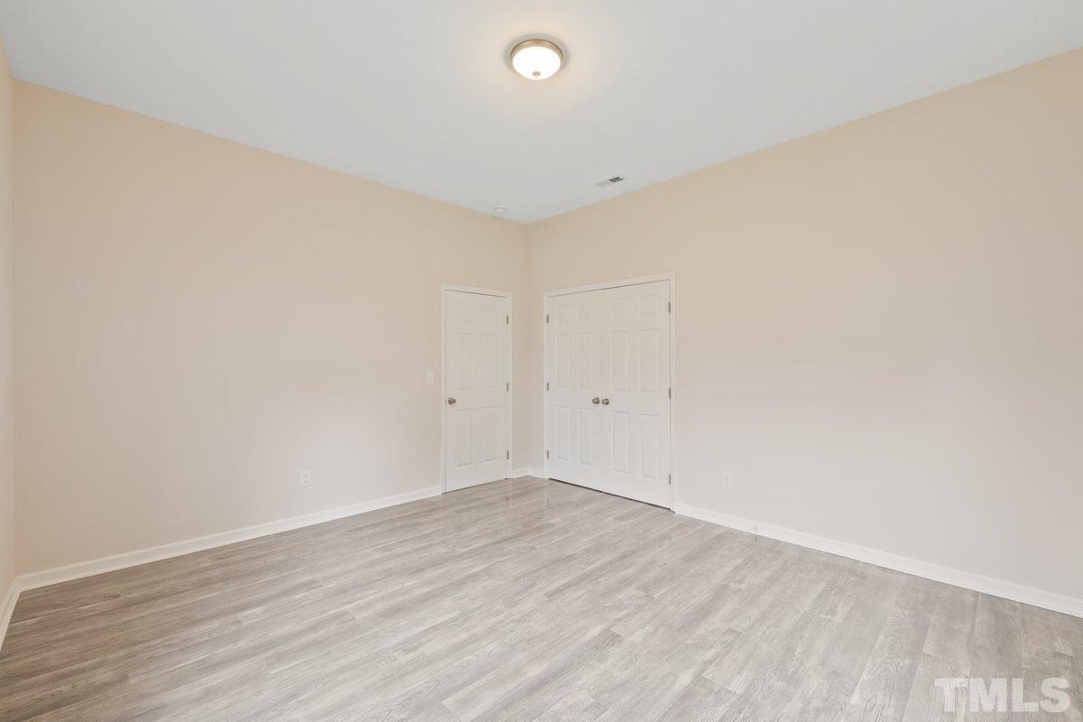 154 Summit Street Roxboro, NC 27573 - Photo 2 of 19 a view of an empty room