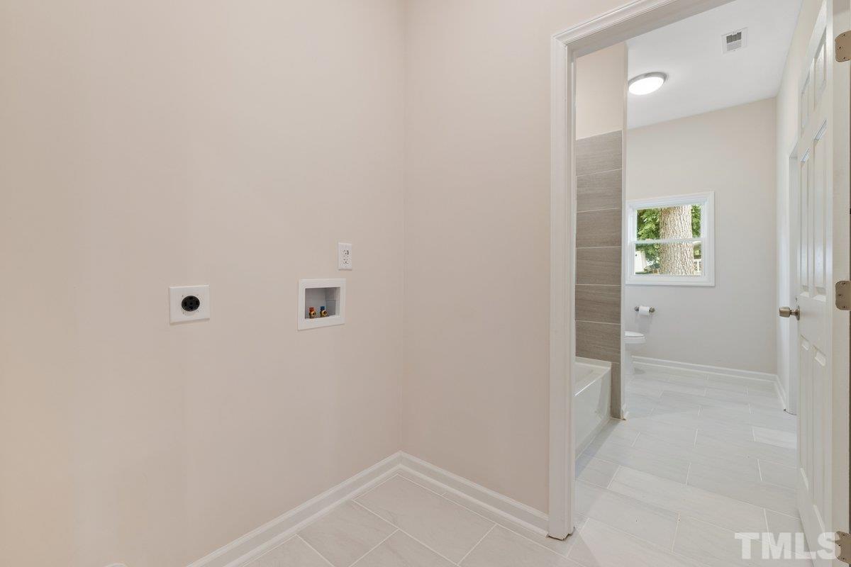 154 Summit Street Roxboro, NC 27573 - Photo 7 of 19 a bathroom with a shower