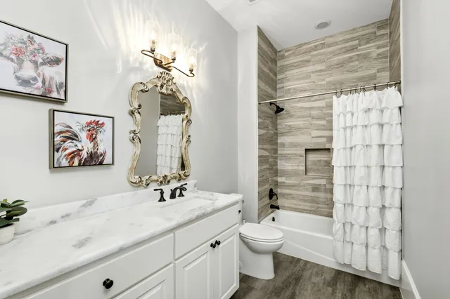 a kitchen with a stove and a refrigerator