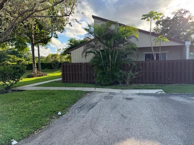 11750 Timbers Way Boca Raton, FL 33428 - Photo 13 of 25 a view of a backyard with green space